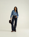 Full view of Women's L/S Denim Popover Top - Medium Wash on model