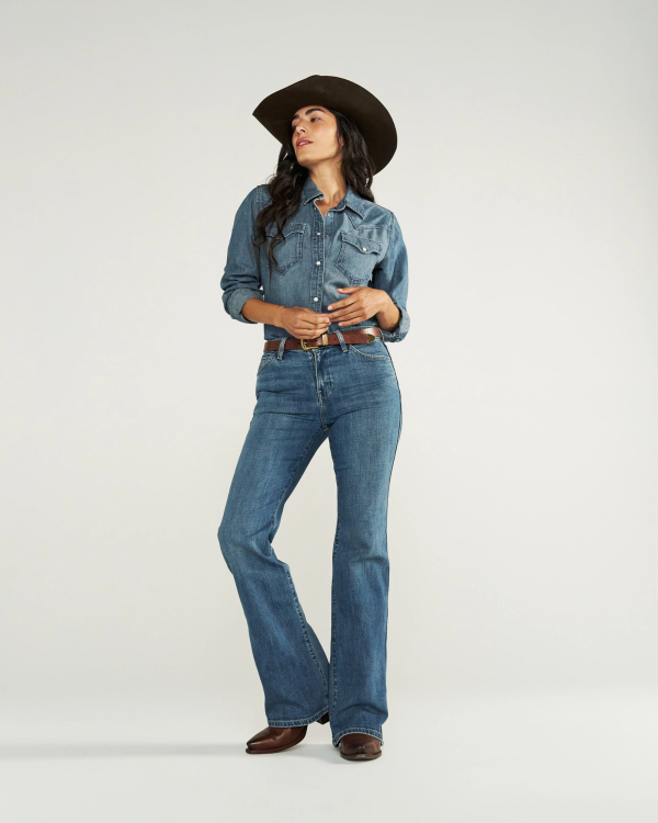 Full view of Women's Mid-Rise Slim Flare - Medium Wash on model