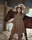 Front view of The Emma Dress by Kristopher Brock - Olive/Beige Floral Cotton Blend on plain background