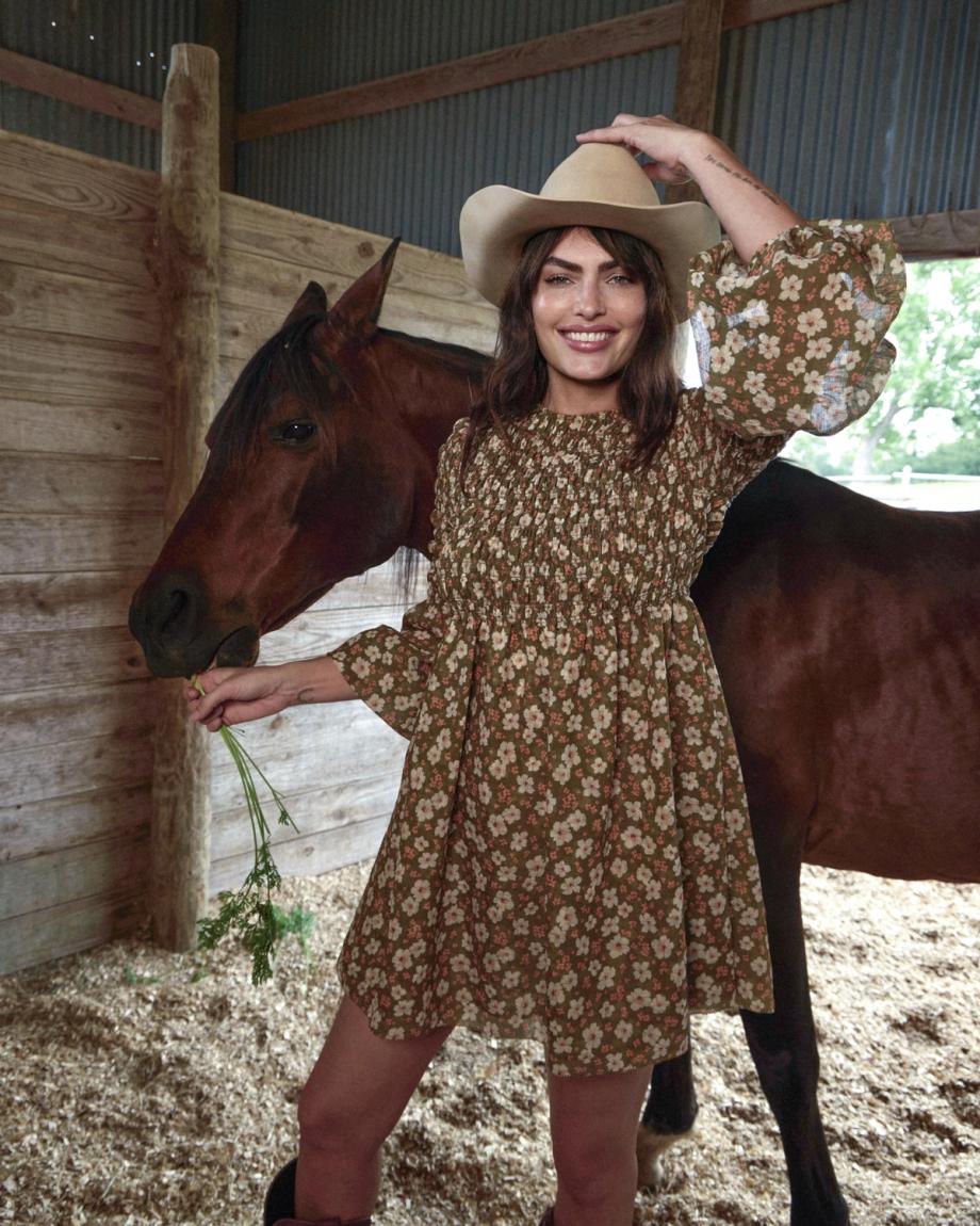 Front view of The Emma Dress by Kristopher Brock - Olive/Beige Floral Cotton Blend on plain background