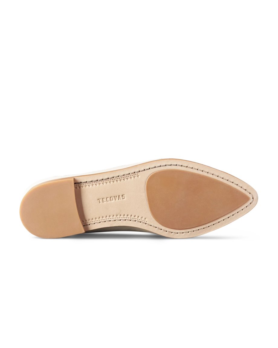 Sole view of The Misty - Bone Cowhide on plain background