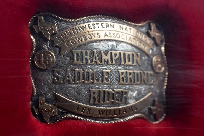 Southwestern National Cowboys Association Champion Saddle Brone Rider award