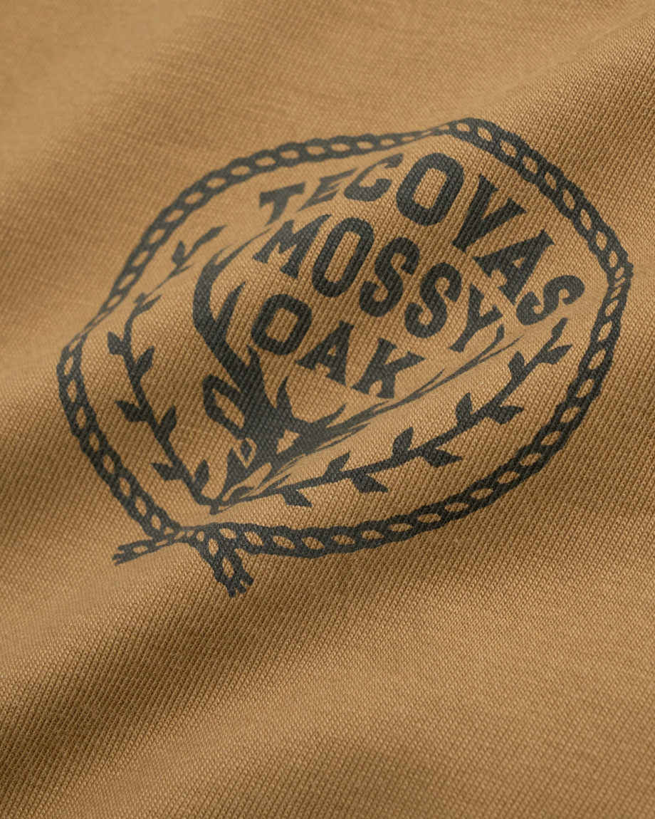 Closeup detail view of Men's Tecovas x Mossy Oak Cowboys & Deer T-Shirt - Olivewood