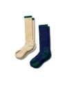 Two pairs of knee-high socks, one solid cream with green trim and one navy with green checkered pattern and green trim, displayed on a plain white background.