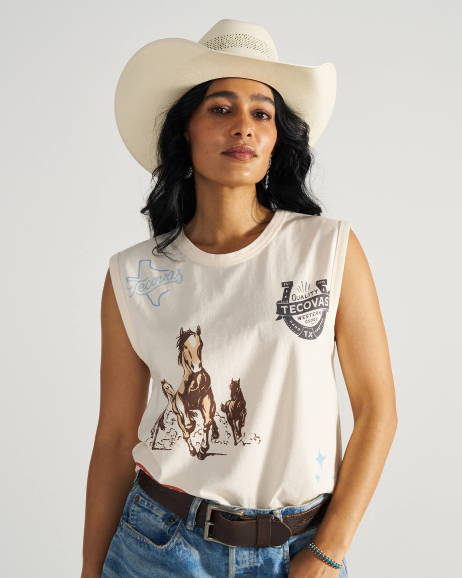 Front view of Women's Muscle Tank - Bone on model