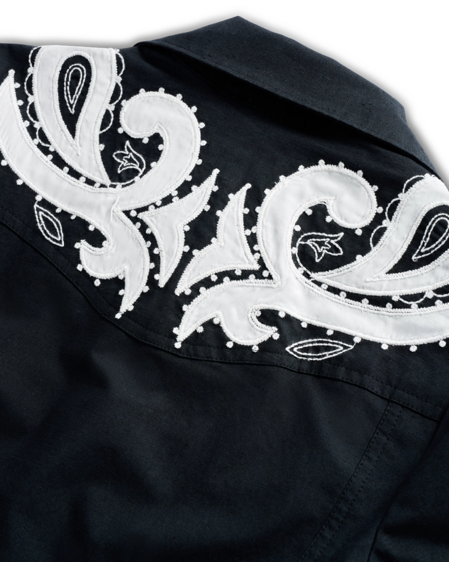 Closeup view of Women's L/S Applique Mini Dress - Black