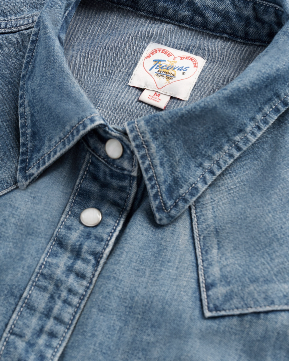Closeup detail view of Women's Denim Pearl Snap (III) - Medium Wash