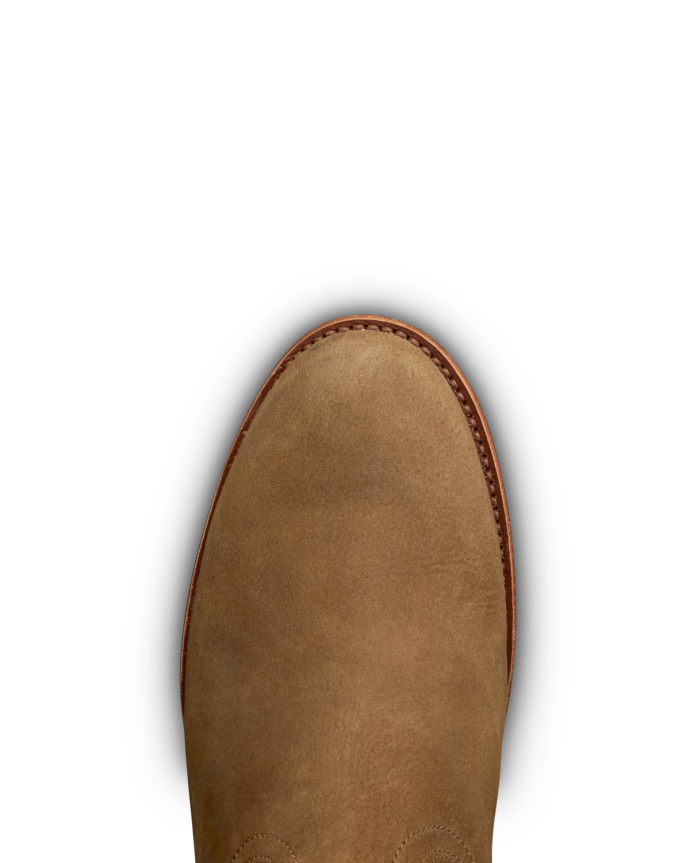 Toe view of The Glen - Light Mesquite Cowhide on plain background