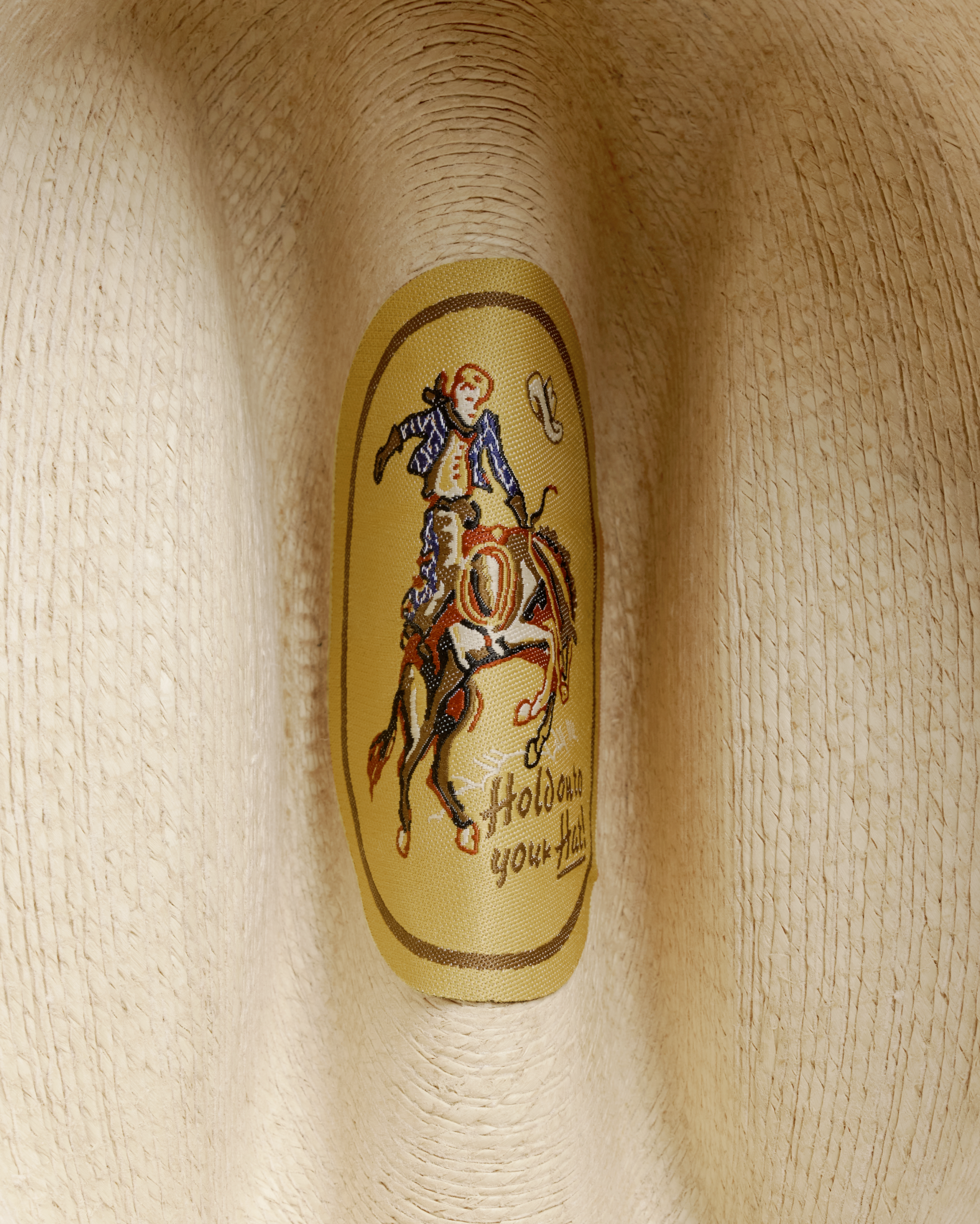 Closeup view of Cattleman Palm Cowboy Hat - Natural