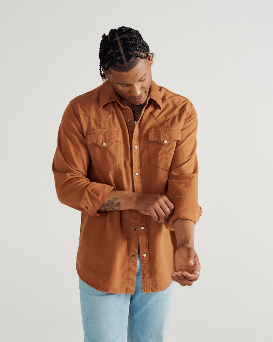 Closeup detail view of Men's Denim Long Sleeve Pearl Snap - Rust