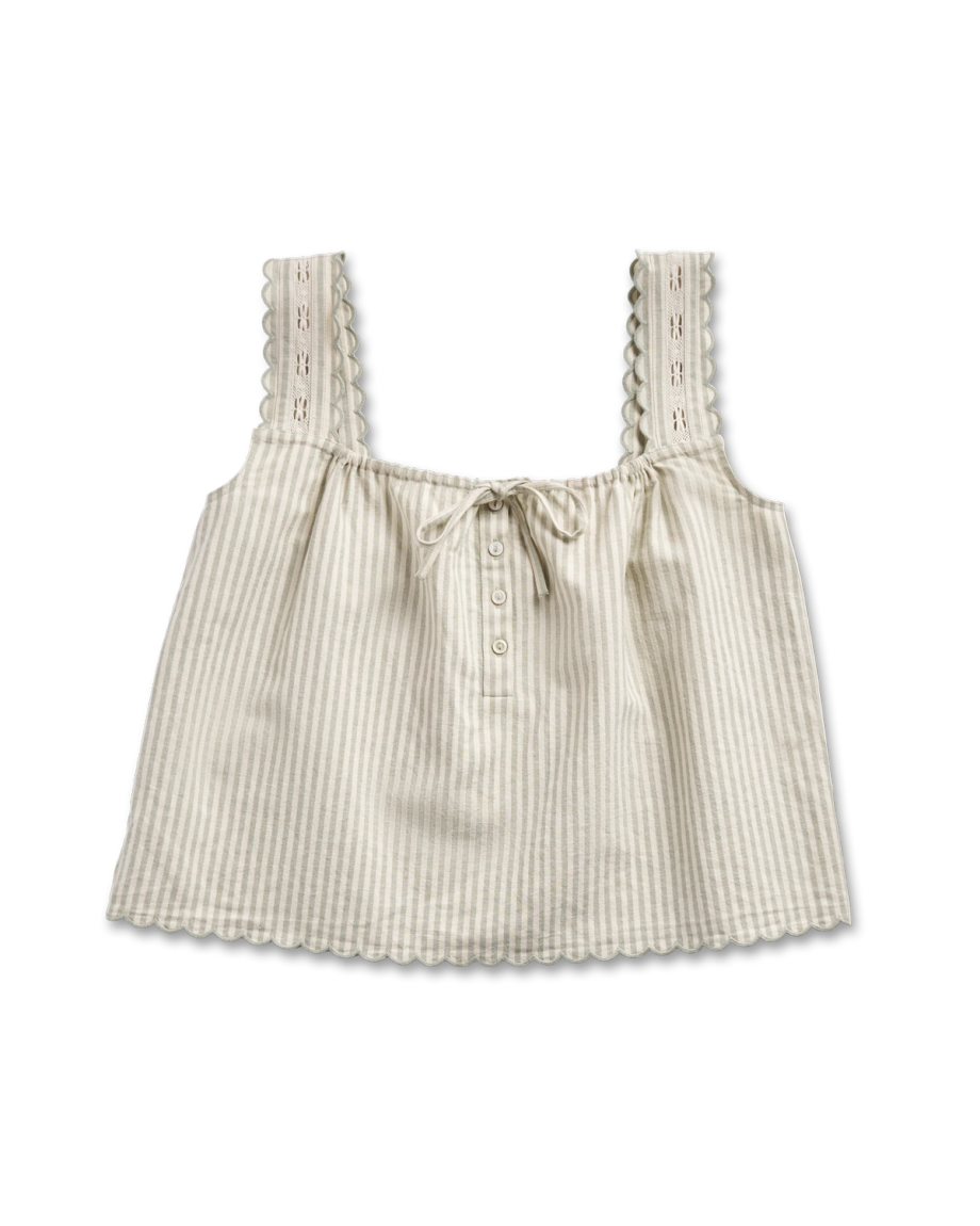 Sleeveless beige and white striped blouse with scalloped edges, decorative buttons, lace-trimmed straps, and a front tie, displayed on a black background.