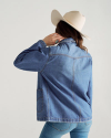 Back view of Women's Denim Chore Jacket - Medium Wash on model