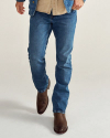 Front view of Men's Rugged Standard Jeans (II) - Medium on model