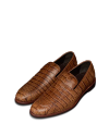 The Bennett in Saddle Alligator. A pair of brown alligator-patterned leather loafers with rounded toes and low heels, displayed on a white background.