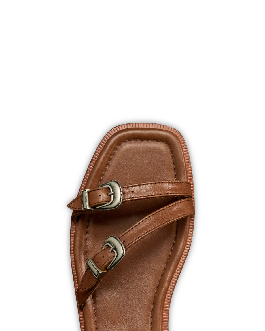 Toe view of The Blakely - Saddle on plain background