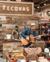 Musician performing in the Tecovas store