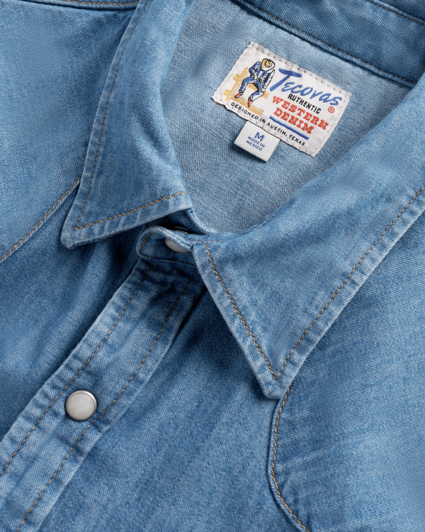 Closeup detail view of Men's Denim Pearl Snap LS - Turquoise / Multi