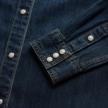Closeup detail view of Women's Denim Pearl Snap (II) - Medium