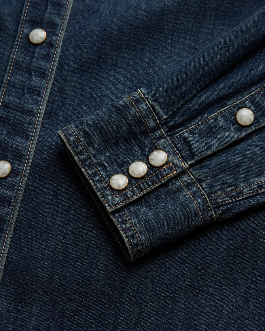 Closeup detail view of Women's Denim Pearl Snap (II) - Medium