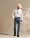 Man wearing a cowboy hat and jeans in a photo studio