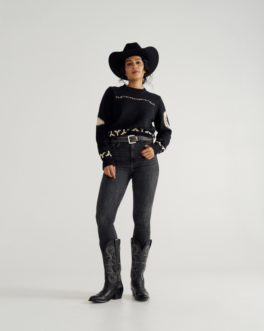 Full view of Women's Crew Neck Lucky Boots Sweater - Black on model