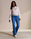Full view of Women's Mid-Rise Bootcut Jeans - Medium on model