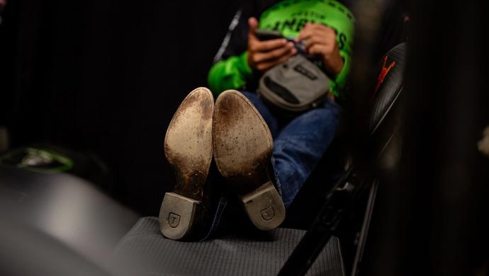 Tecovas boots propped up