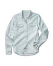 Light blue denim shirt with button-up front and two chest pockets, laid flat on a solid black background.