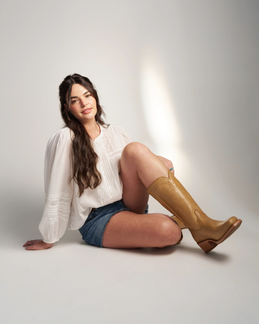 Full view of The Charlie Wide Calf - Camel Cowhide on model