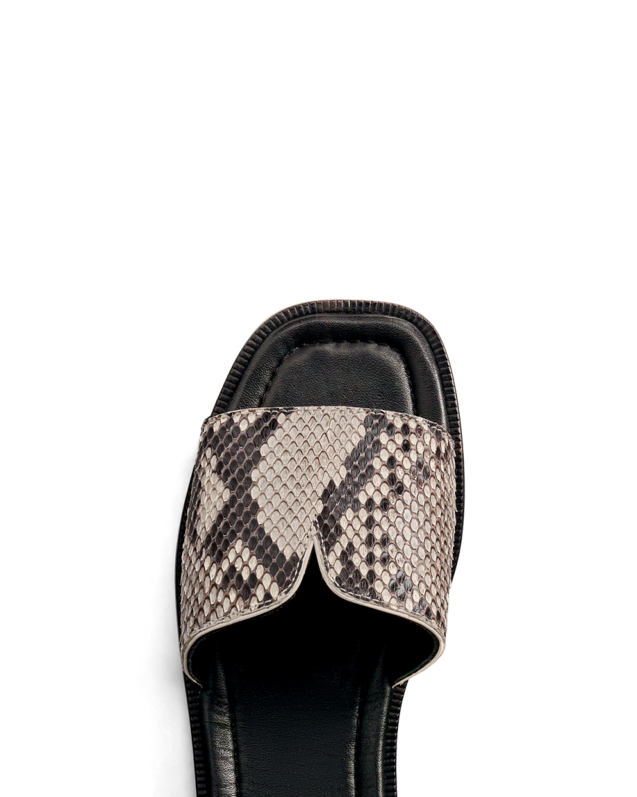 Toe view of The Carmen - Black/Bone on plain background