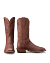 A pair of brown leather cowboy boots with decorative stitching, shown from the front and side against a white background.