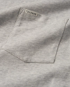 Closeup of the pocket on the men's standard issue pocket tee in heather grey