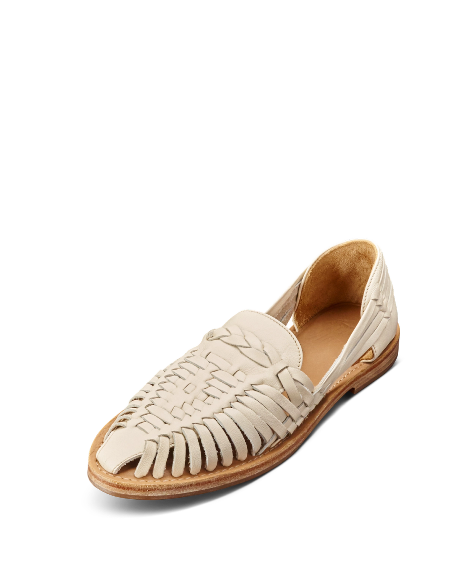 Quarterfront view of The Maya - Bone Cowhide on plain background