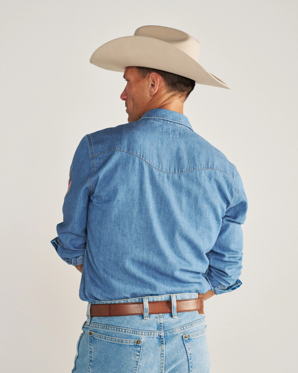 Closeup detail view of Men's Denim Pearl Snap LS - Turquoise / Multi