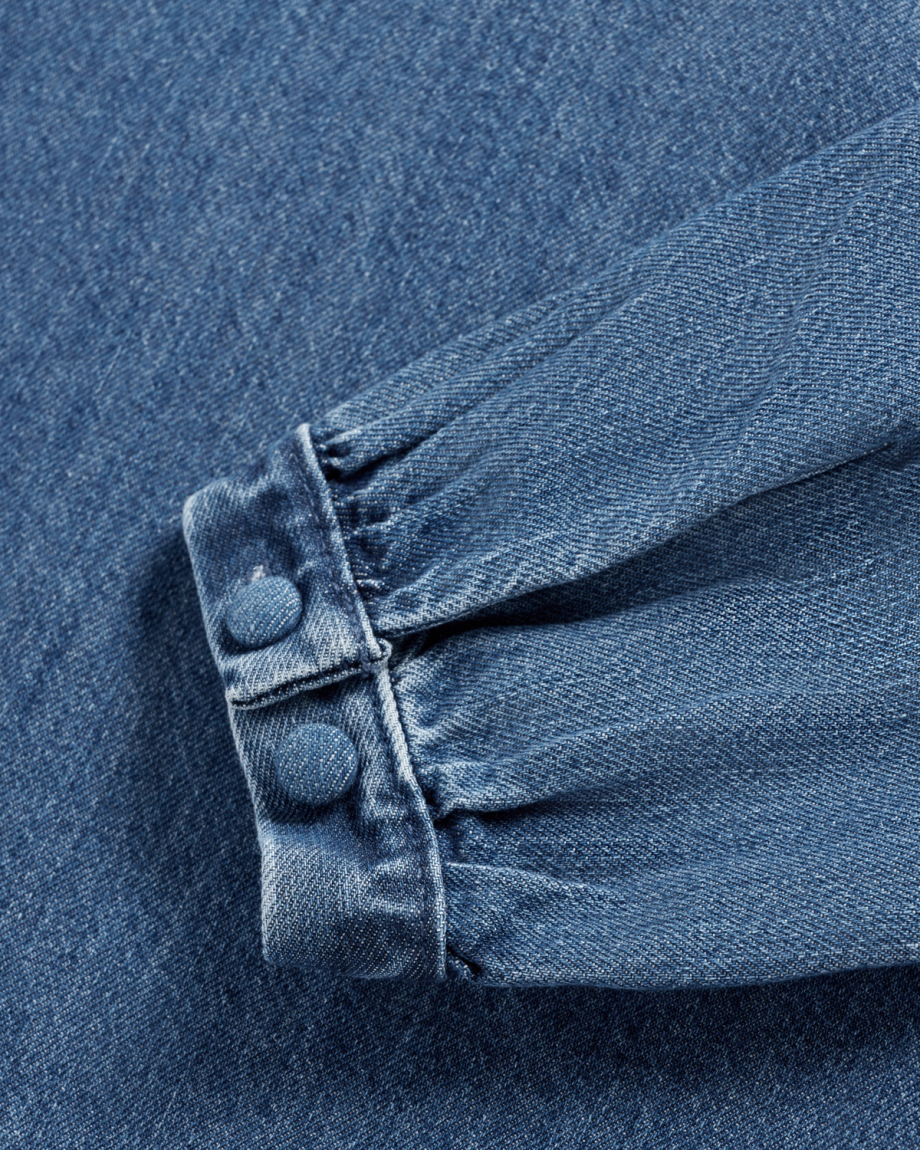 Closeup view of Women's L/S Denim Popover Top - Medium Wash