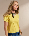 Image of a woman wearing the Women's Vintage Ringer Tee in the color Golden Yellow/Tan