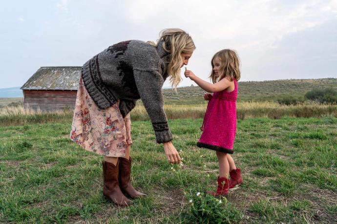 mom and daughter in a field