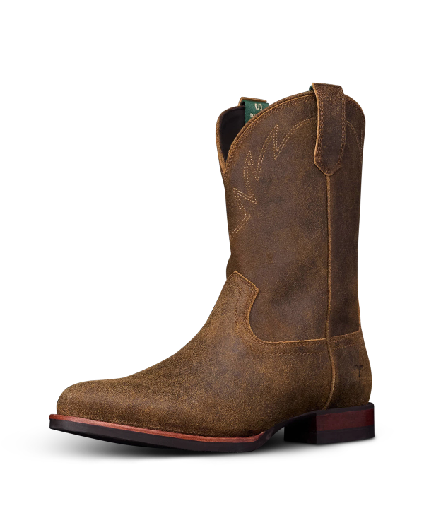 The Glen in Dustwood Roughout. A brown leather cowboy boot with decorative stitching, a low heel, pull straps, and a square toe—crafted in Dustwood Roughout—shown against a plain white background.