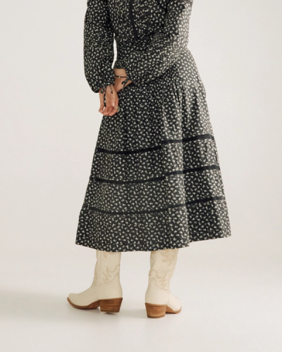 Now showing image 1 of 5: Front view of Women's Cotton Poplin Midi Skirt - Black / White on model