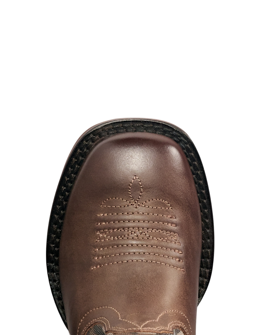 Close-up of a brown leather boot with decorative stitching on the square toe and a black textured outsole, viewed from above.
