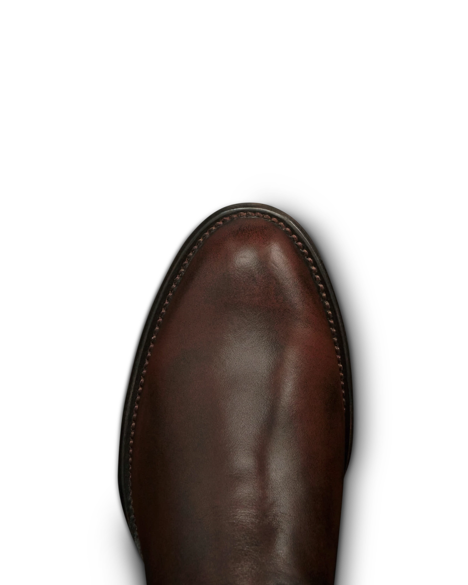 Toe view of The Dean - Iced Tea Cowhide on plain background