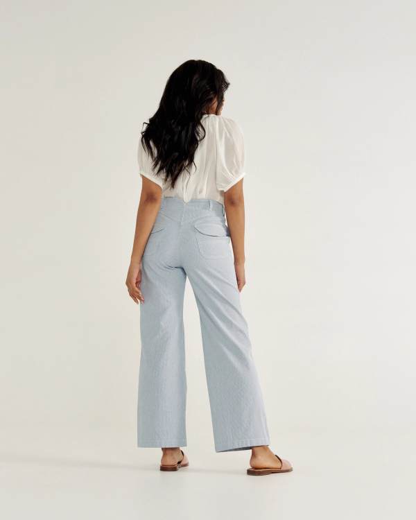 Back view of Women's Carpenter Pant - Blue / White Cotton on model