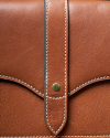 Closeup view of Women's Sierra Convertible Crossbody - Saddle Tan