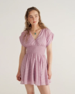Front view of Women's Mini V-Neck Ruched Dobby Dress - Lavender on model