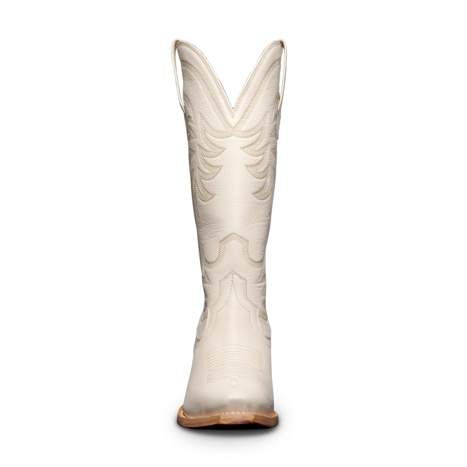 Front view of a tall, white cowboy boot with intricate stitching and a brown sole.
