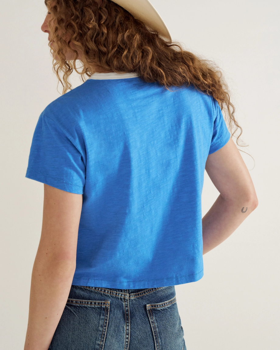 Back view of Women's Vintage Ringer Tee - Blue / White on model