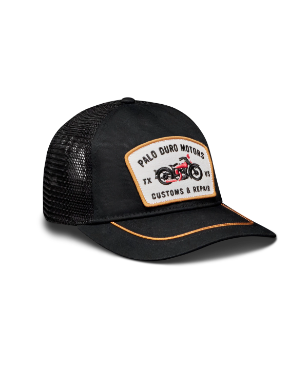 Quarterfront view of Palo Duro Motors 5 Panel Low Pro Trucker - Black on plain background