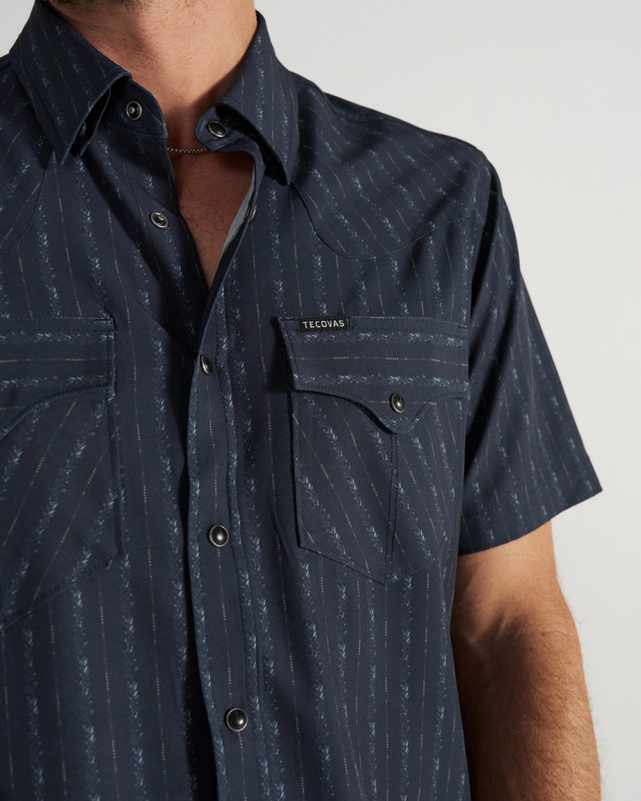 Closeup detail view of Men's Performance Western Short Sleeve Pearl Snap - Dark Navy/Multi