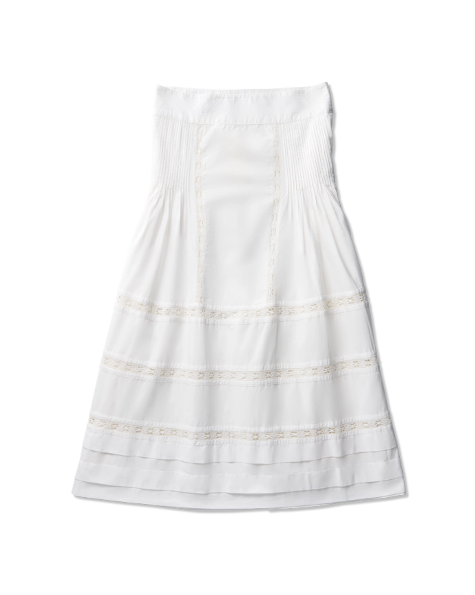 White strapless dress with subtle lace detailing and pleated sections, laid flat on a black background.