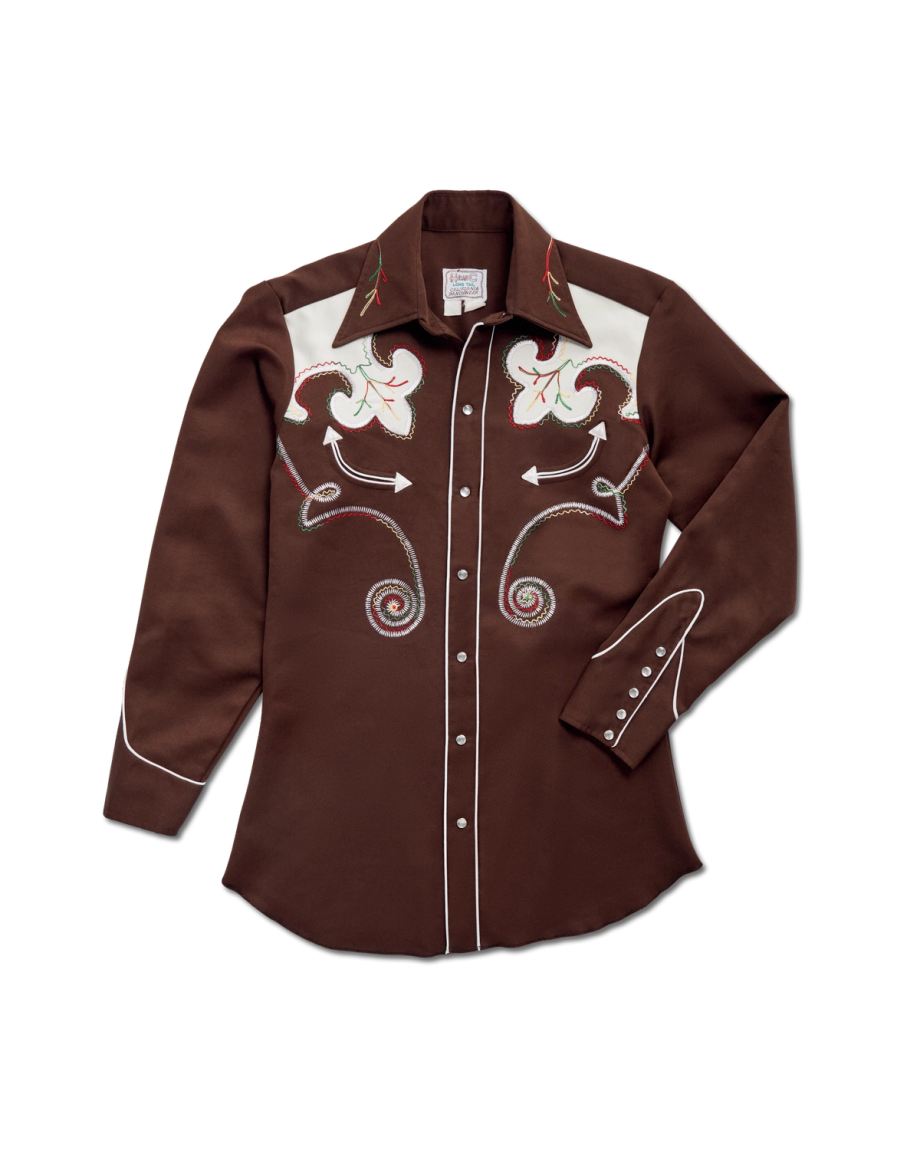 Closeup detail view of Tecovas x Cathy Hahn Men’s Vintage Smile Pocket Pearl Snap - Chocolate / Multi